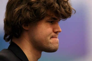 Nine-Year-Old Chess Prodigy Holds Magnus Carlsen to Draw in Online Tournament
Alternatively:
Magnus Carlsen Held to Draw by 9-Year-Old Indian Chess Player in Online Tournament
