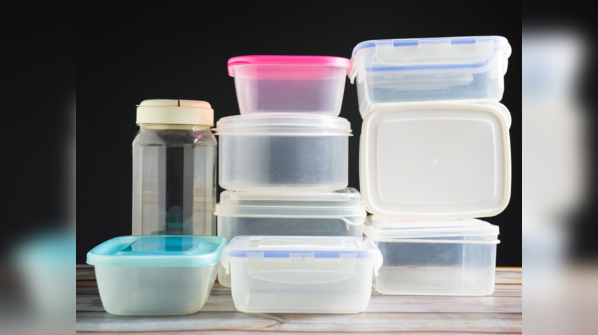 Glass containers filled with food in a refrigerator