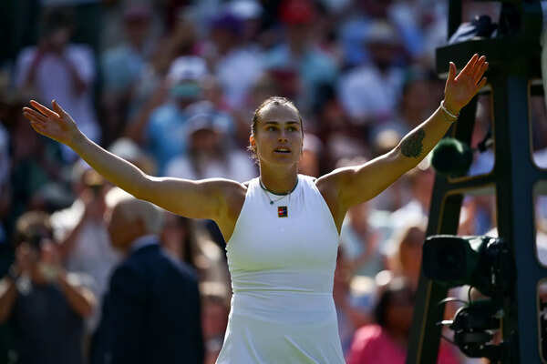 Aryna Sabalenka celebrates Wimbledon victory